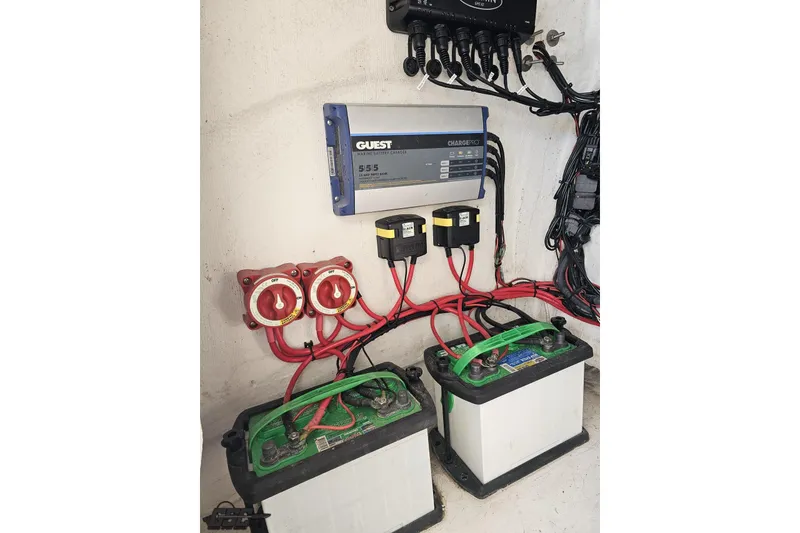 Slide: The Image of Electrical system of a 2021 Avanti 36 Center Console with batteries and wiring. - 69