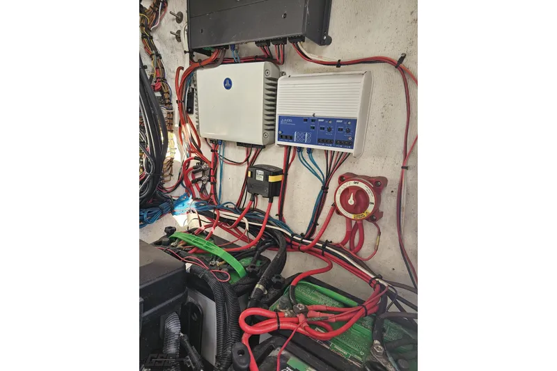 Slide: The Image of Electrical wiring and components inside a 2021 Avanti 36 Center Console boat. - 70