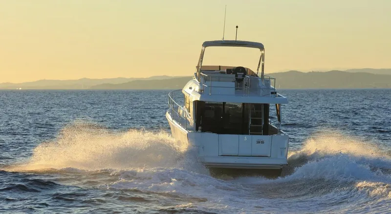 Slide: The Image of 2021 Beneteau Swift Trawler 35 cruising at sunset. - 7