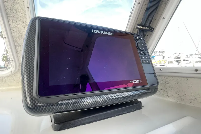 Slide: The Image of Lowrance HDS9 fishfinder on 1993 Davis Radoncraft boat dashboard. - 24