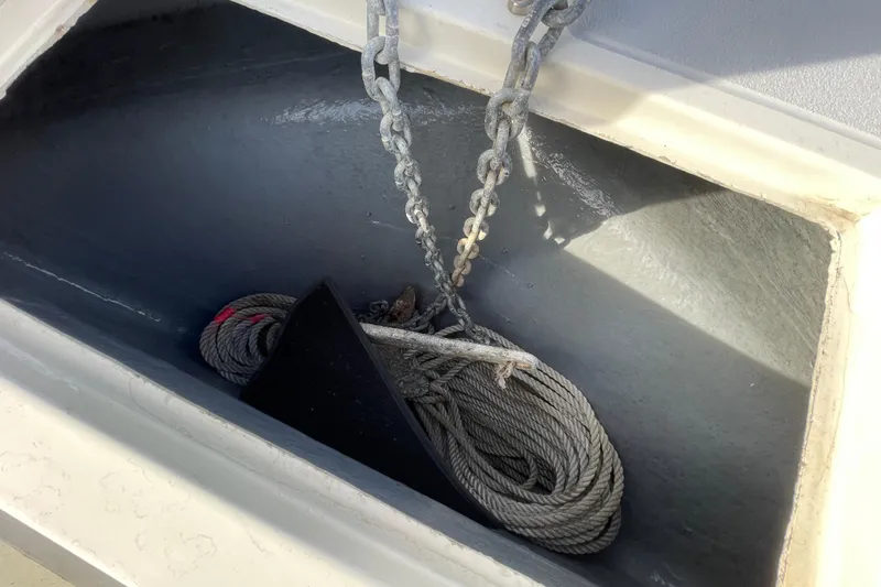 Slide: The Image of Anchor and rope in a 1993 Davis Radoncraft boat compartment. - 37