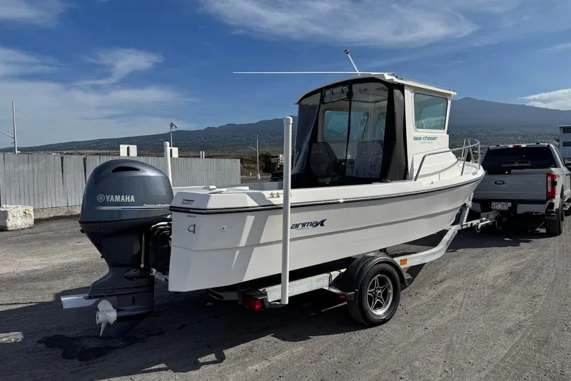 Slide: The Image of 2024 Arima Sea Chaser 19 Yellowtail Edition boat on trailer with Yamaha outboard motor. - 11