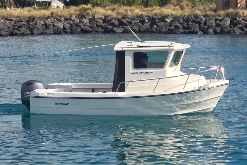 Slide: The Image of 2024 Arima Sea Chaser 19 Yellowtail Edition boat on water, featuring Yamaha outboard motor. - 6