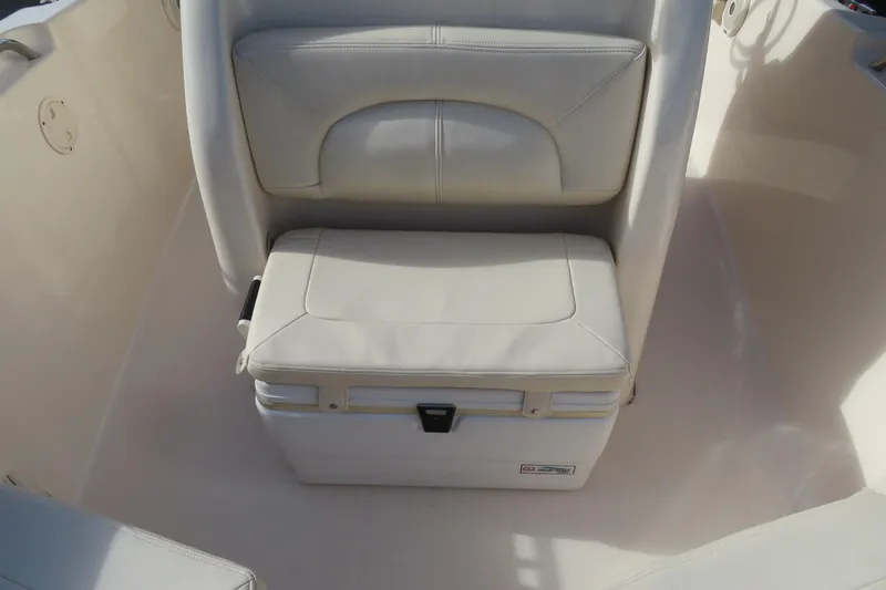 Slide: The Image of 2016 Grady-White Fisherman 209 boat interior with cushioned seating and cup holder. - 15