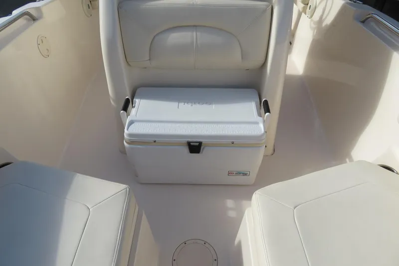 Slide: The Image of Open storage compartment on 2016 Grady-White Fisherman 209 boat. - 16