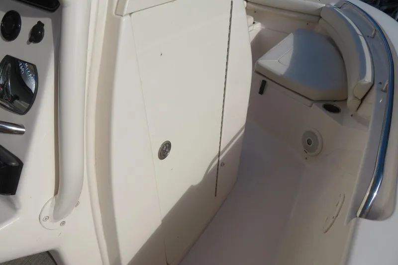 Slide: The Image of 2016 Grady-White Fisherman 209 boat interior, featuring sleek design and sturdy handrails. - 21