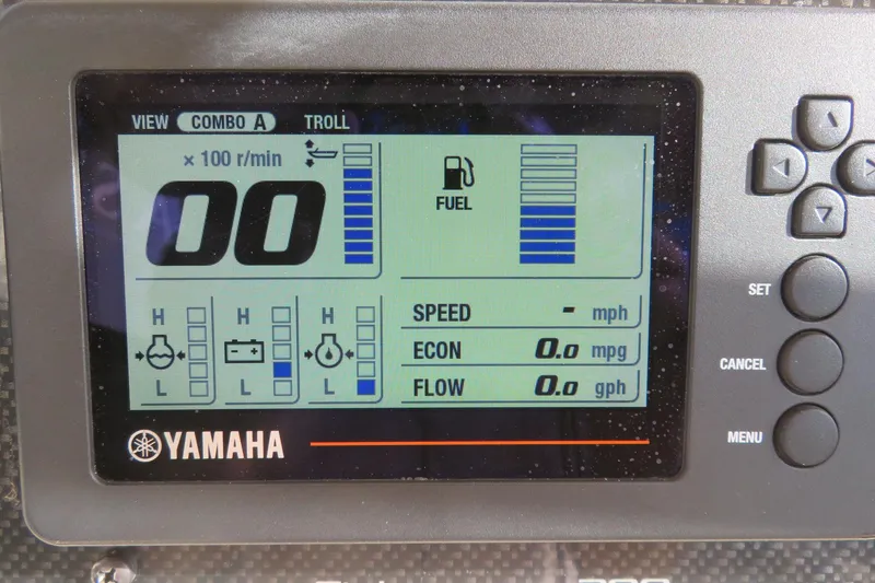 Slide: The Image of 2016 Grady-White Fisherman 209 boat dashboard with steering wheel and control panel. - 40