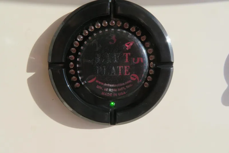 Slide: The Image of Yamaha display panel on 2016 Grady-White Fisherman 209 boat showing fuel and engine metrics. - 43