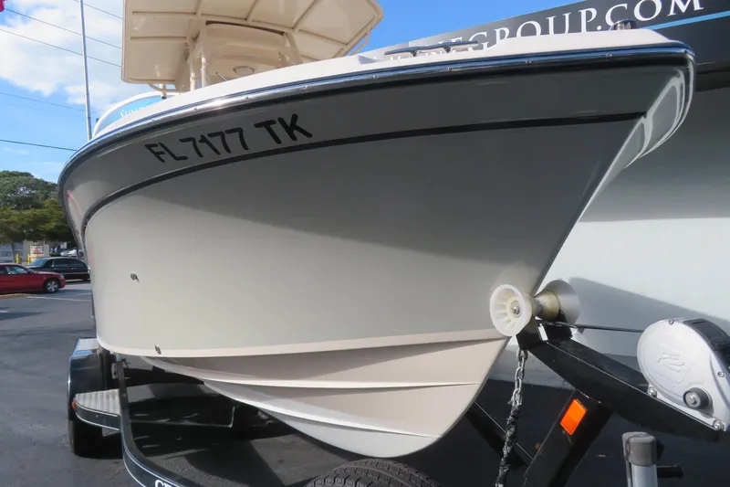 Slide: The Image of 2016 Grady-White Fisherman 209 boat on trailer outside marine dealership. - 5