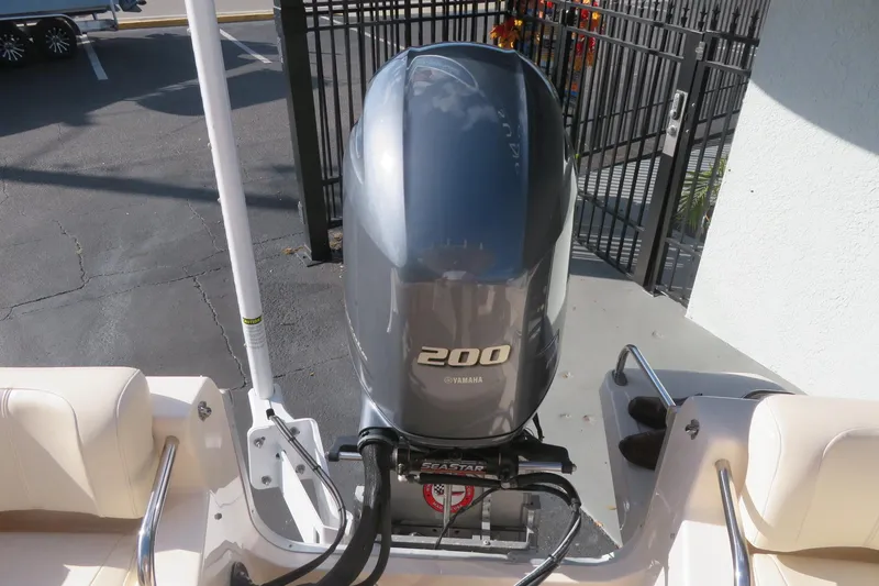 Slide: The Image of Close-up of a Ritchie compass on a 2016 Grady-White Fisherman 209 boat. - 51