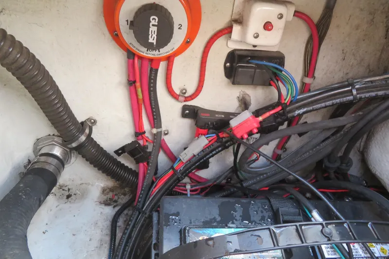 Slide: The Image of 2016 Grady-White Fisherman 209 boat storage compartment with latch and light fixture. - 57