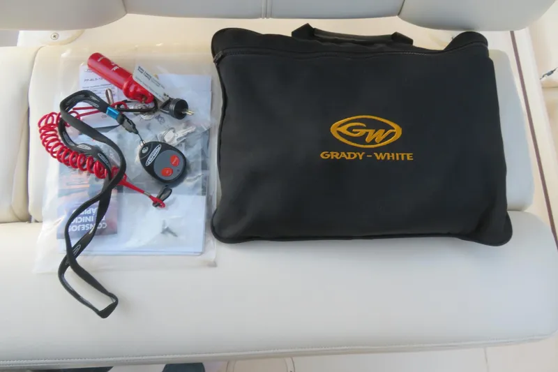 Slide: The Image of 2016 Grady-White Fisherman 209 boat detail with metal fitting and warning label. - 63