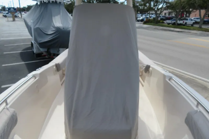Slide: The Image of 2016 Grady-White Fisherman 209 boat with covered console in parking lot. - 69