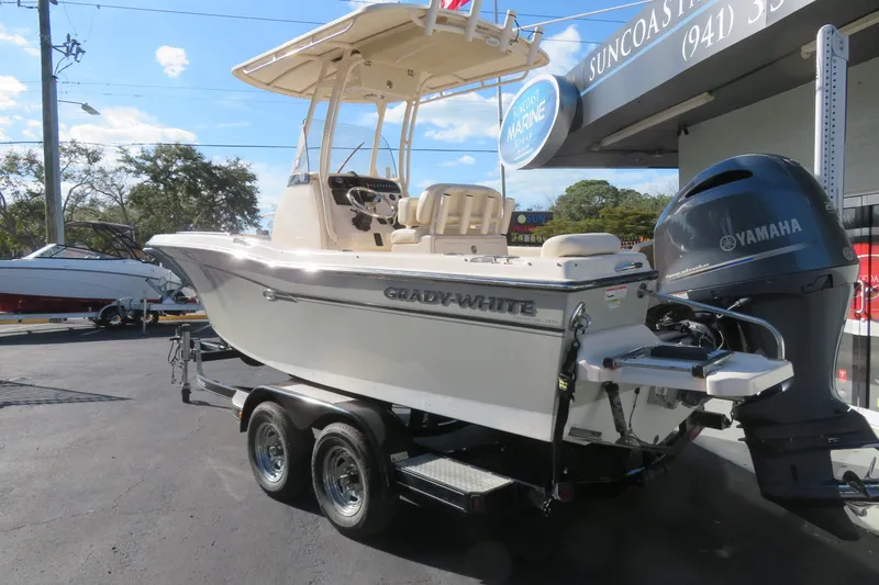 Slide: The Image of 2016 Grady-White Fisherman 209 boat with Yamaha engine on trailer, parked outside dealership. - 7