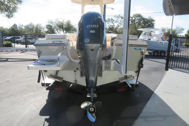 Slide: The Image of 2016 Grady-White Fisherman 209 boat with Yamaha 200 outboard motor, parked outdoors. - 8