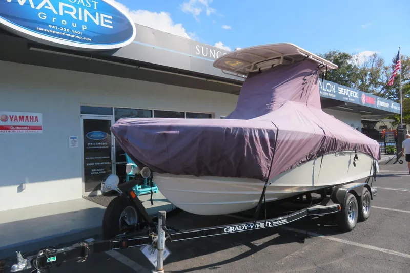 Slide: The Image of 2016 Grady-White Fisherman 209 boat covered on trailer at marine dealership. - 80