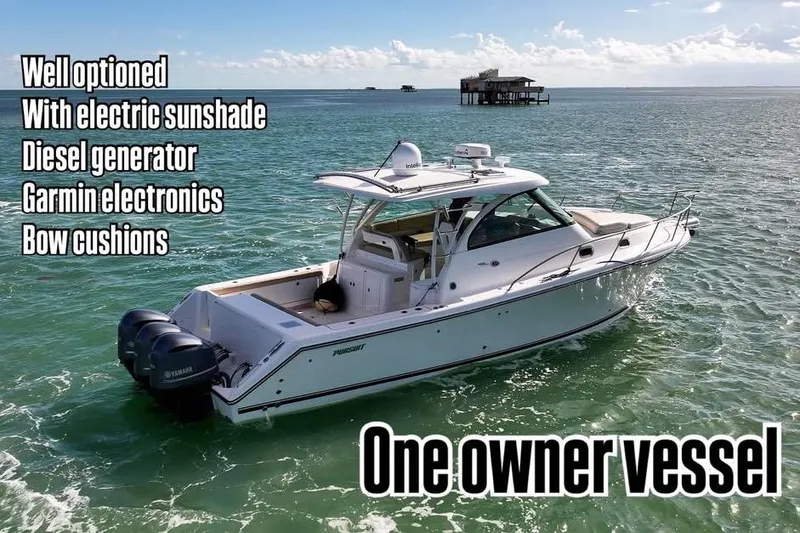 The Image of 2016 Pursuit OS 385 Offshore boat with electric sunshade, diesel generator, and Garmin electronics. - 0