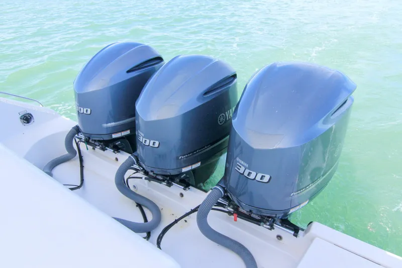 Slide: The Image of Triple Yamaha 300 outboard engines on a 2016 Pursuit OS 385 Offshore boat. - 60