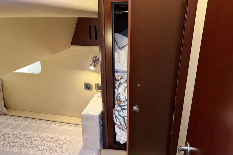 Slide: The Image of Luxurious cabin interior of 2006 Sea Ray 44 Sedan Bridge yacht. - 53