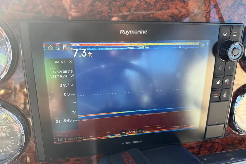 Slide: The Image of Raymarine display on 2006 Sea Ray 44 Sedan Bridge showing depth and navigation data. - 69