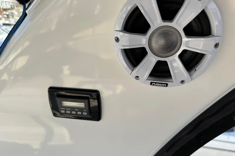 Slide: The Image of Speaker and control panel on 2006 Sea Ray 44 Sedan Bridge yacht interior. - 78