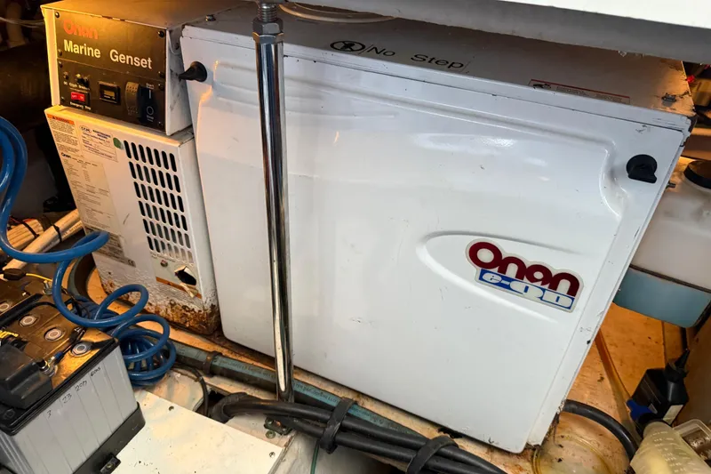 Slide: The Image of Onan marine generator in 2006 Sea Ray 44 Sedan Bridge engine room. - 82