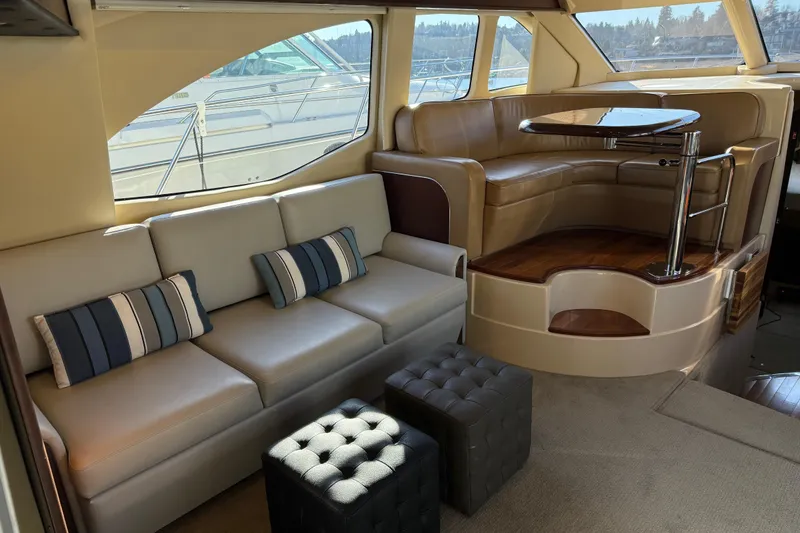 Slide: The Image of Luxurious interior of a 2006 Sea Ray 44 Sedan Bridge yacht with elegant seating. - 9