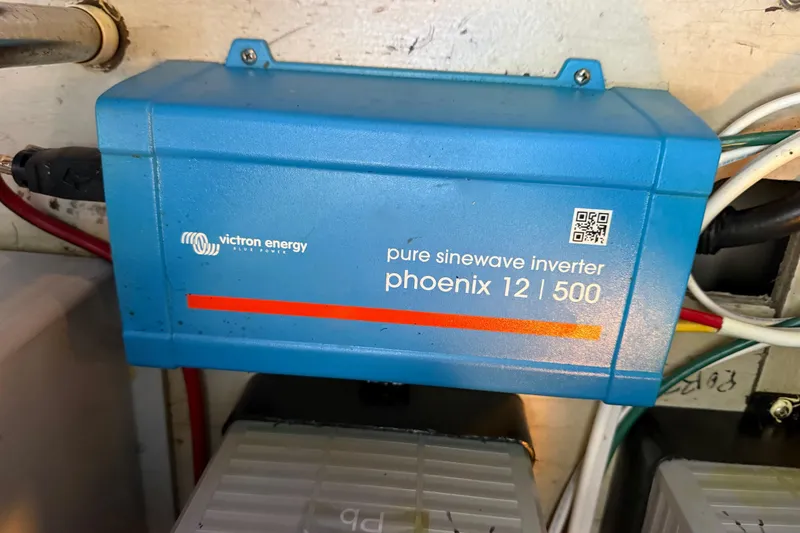 Slide: The Image of Blue Victron Energy Phoenix 12/500 pure sine wave inverter on a 2006 Sea Ray 44 Sedan Bridge. - 91