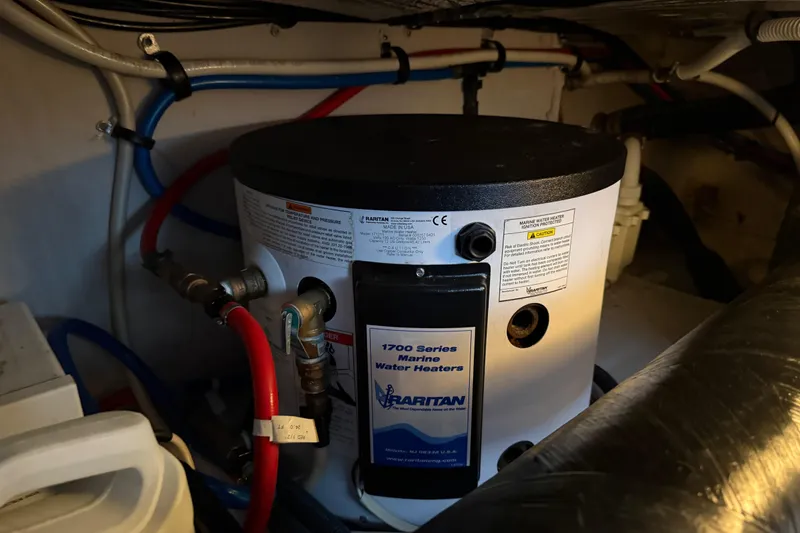 Slide: The Image of Marine water heater in 2006 Sea Ray 44 Sedan Bridge engine room. - 92