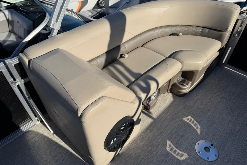 Slide: The Image of Luxurious seating on 2021 Avalon LSZ 2485 pontoon boat with cup holders and speaker. - 11