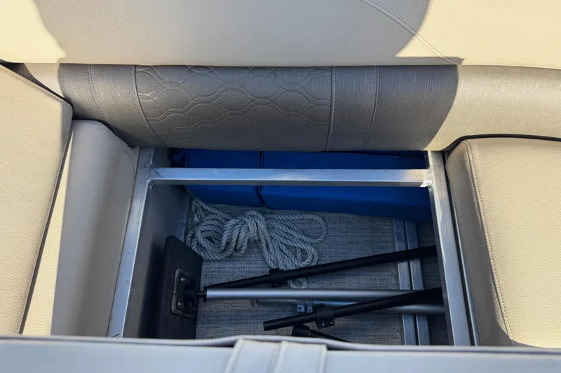 Slide: The Image of Storage compartment in 2021 Avalon LSZ 2485 boat with ropes and equipment. - 12