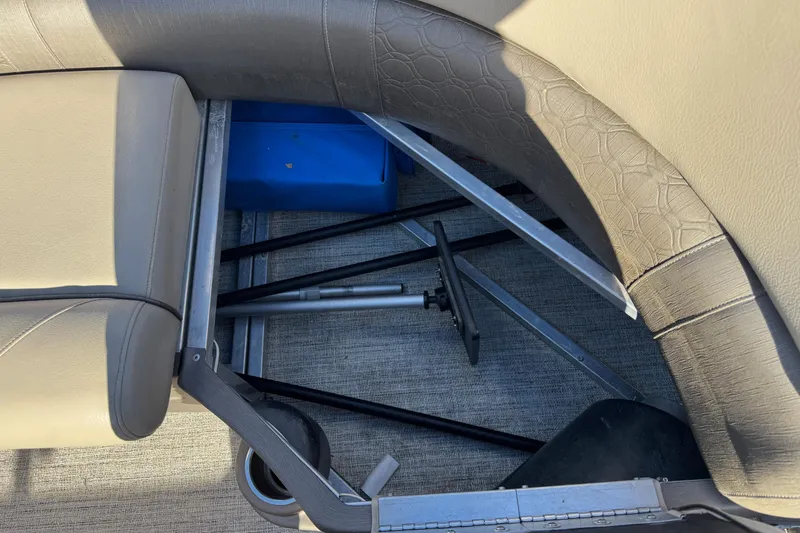 Slide: The Image of 2021 Avalon LSZ 2485 boat interior with storage compartment and seating. - 13