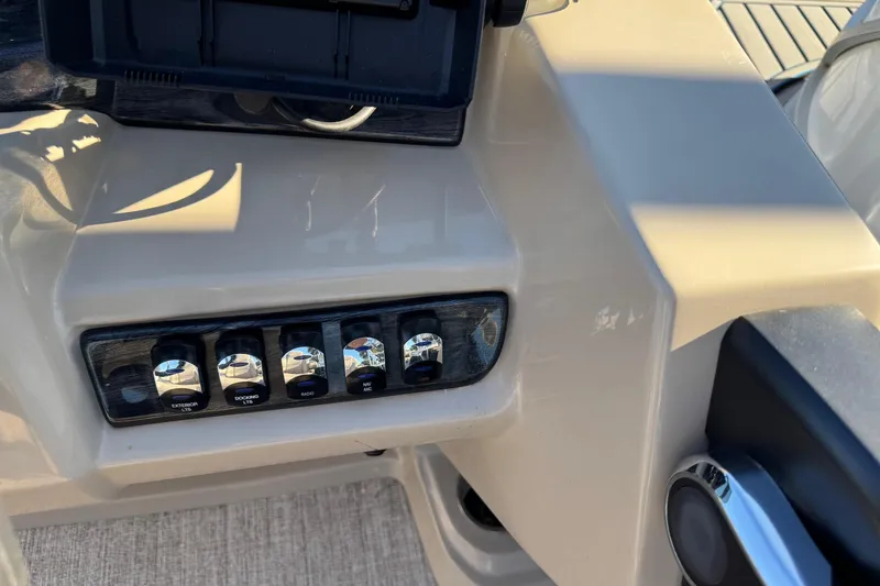 Slide: The Image of Control panel of 2021 Avalon LSZ 2485 boat with labeled switches. - 20