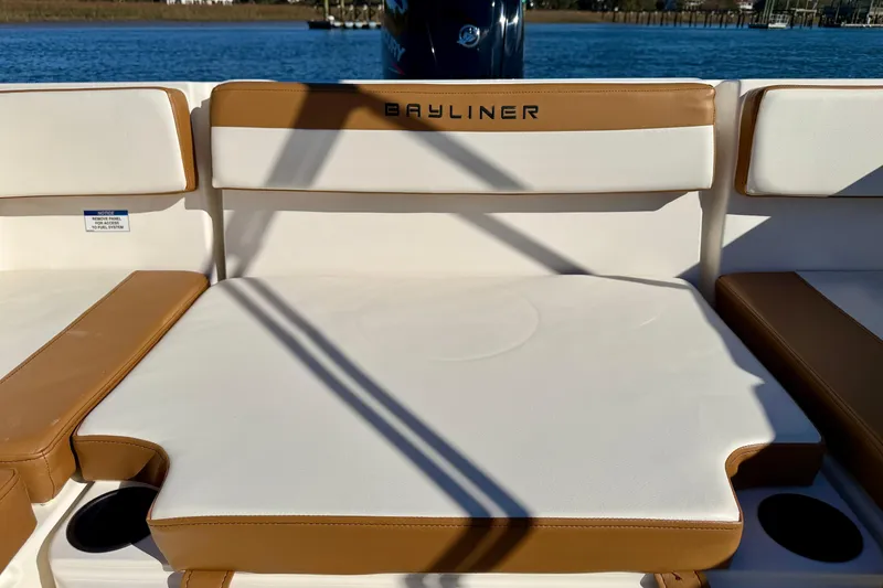 Slide: The Image of 2023 Bayliner VR4 Bowrider OB boat seat with tan and white upholstery. - 20