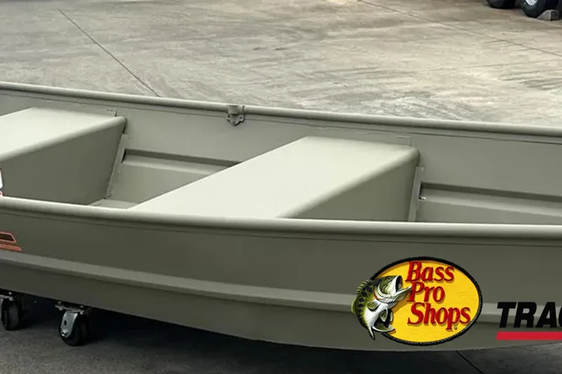 Slide: The Image of 2026 Tracker Grizzly 12 Jon boat with Bass Pro Shops logo on display. - 3