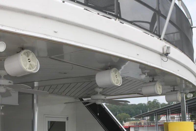 Slide: The Image of 2008 Sharpe 105 Custom Houseboat with ceiling fans and lights on the deck. - 16