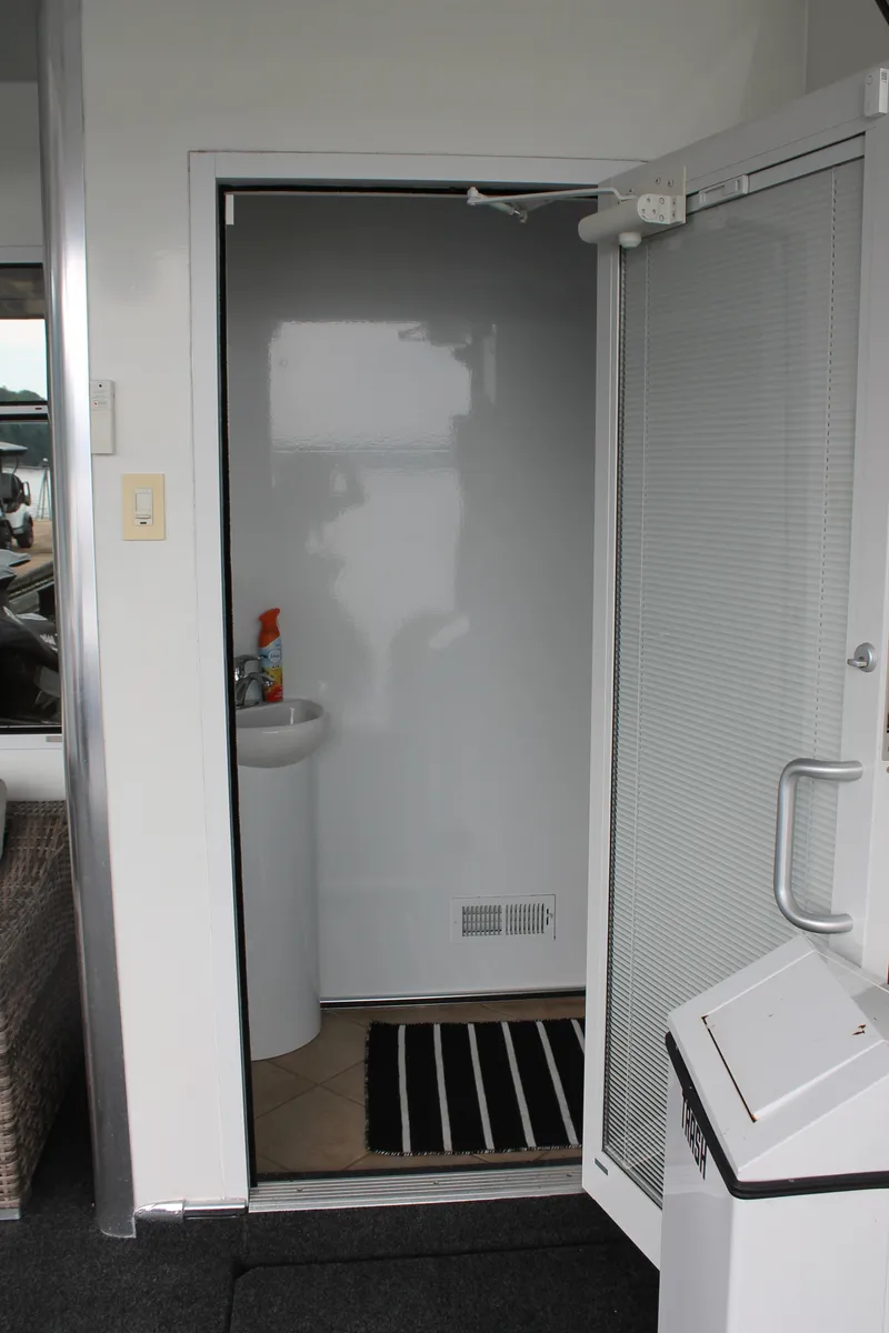 Slide: The Image of Interior view of 2008 Sharpe 105 Custom Houseboat bathroom entrance. - 20