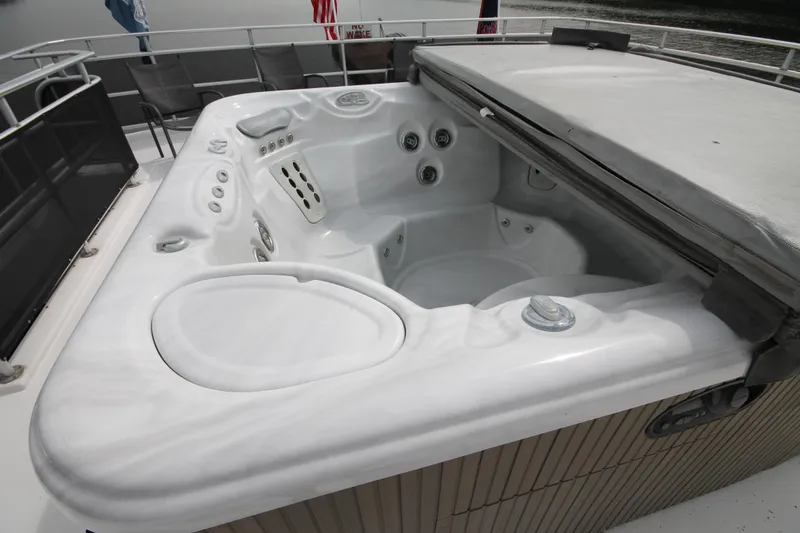 Slide: The Image of Luxurious hot tub on 2008 Sharpe 105 Custom Houseboat deck. - 26