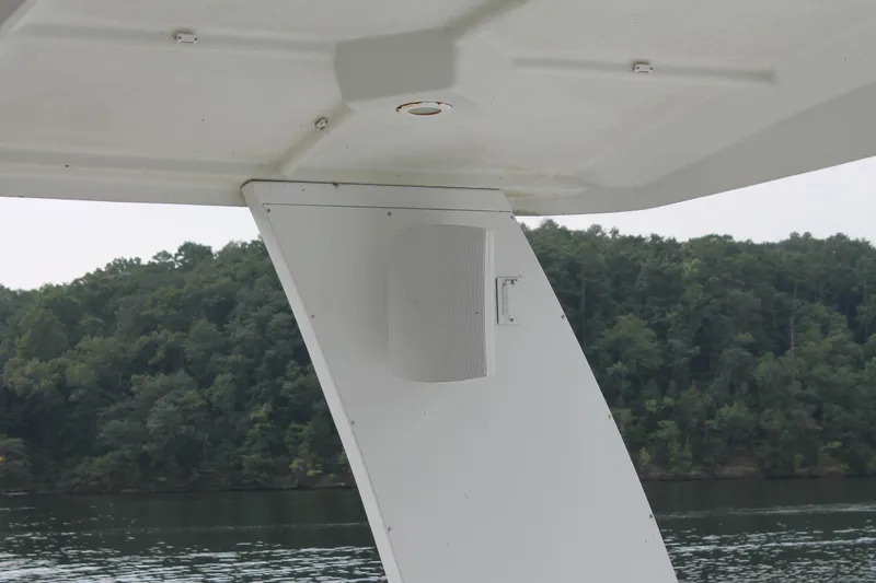 Slide: The Image of Outdoor speaker on 2008 Sharpe 105 Custom Houseboat, with lake and forest background. - 42