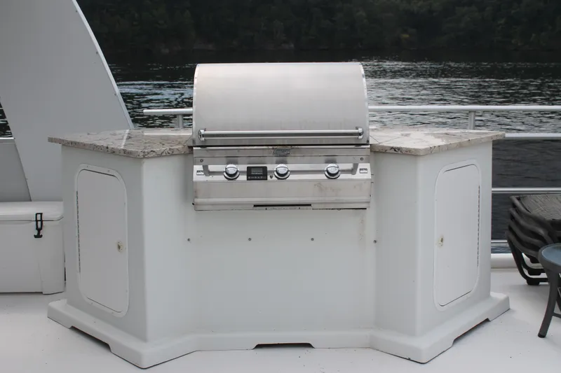 Slide: The Image of Outdoor grill on 2008 Sharpe 105 Custom Houseboat deck, overlooking water. - 43