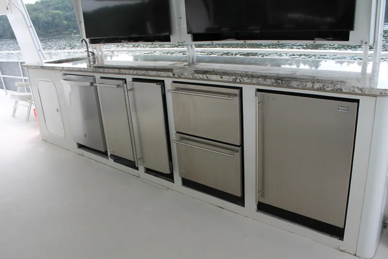 Slide: The Image of Outdoor kitchen on 2008 Sharpe 105 Custom Houseboat with stainless steel appliances. - 44