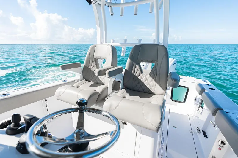 Slide: The Image of Manufacturer Provided Image: 2025 Sportsman Open 282 Center Console boat interior with ocean view. - 8