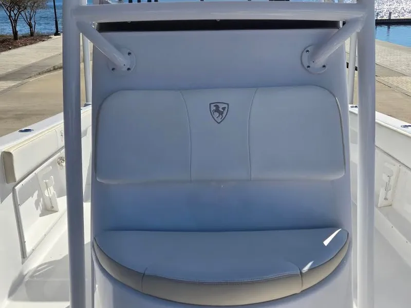 Slide: The Image of 2024 Century 2300 Center Console boat seat with logo. - 11