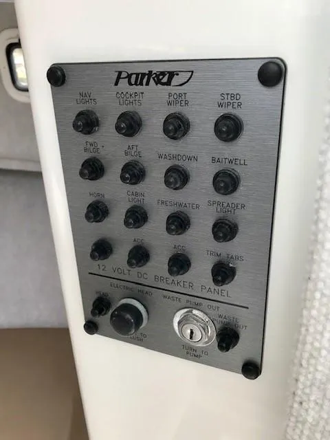 Slide: The Image of Control panel of 2017 Parker 2520 XL Sport Cabin boat. - 15