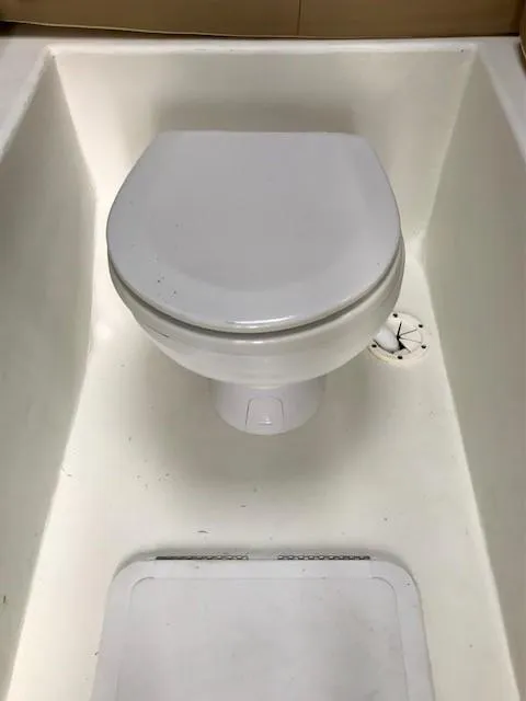 Slide: The Image of Toilet in Parker 2520 XL Sport Cabin boat, year 2017. - 18