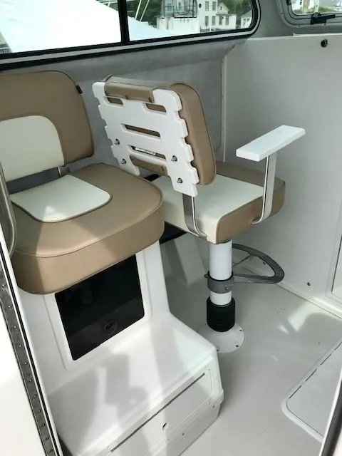 Slide: The Image of Interior of 2017 Parker 2520 XL Sport Cabin with beige seats. - 9
