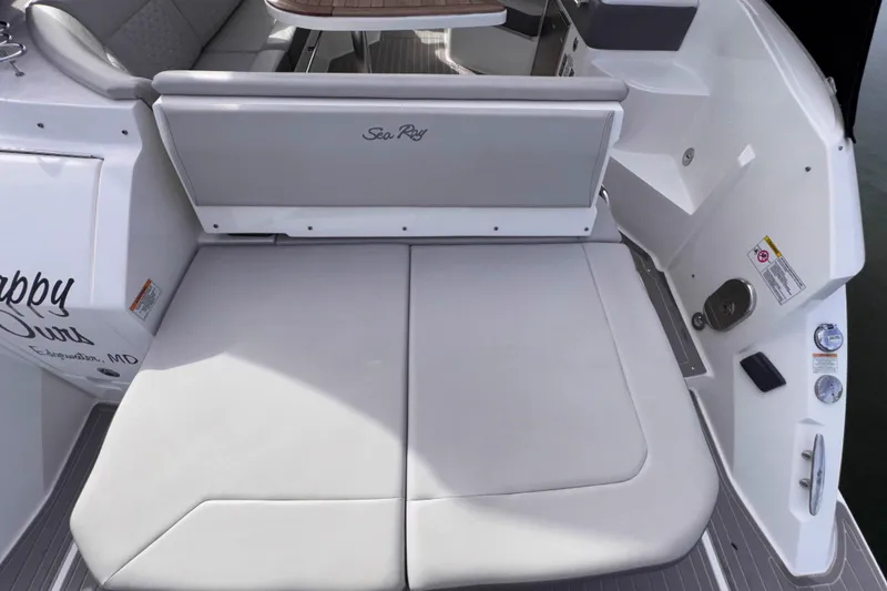 Slide: The Image of 2022 Sea Ray Sundancer 320 boat with spacious rear seating and elegant design. - 27