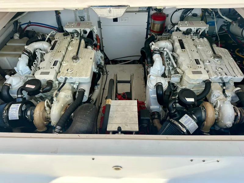 Slide: The Image of Engine compartment of a 2005 Tiara Yachts 3600 Open, showcasing dual inboard engines. - 29