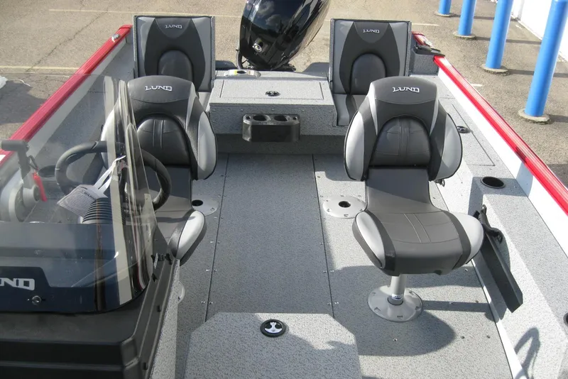 Slide: The Image of 2024 Lund 1775 Adventure SS boat storage compartment with Mercury propeller box. - 15