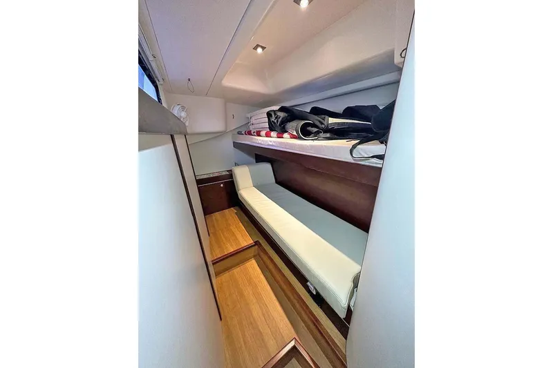 Slide: The Image of Interior of a 2010 Hanse 545 yacht with bunk beds. - 23